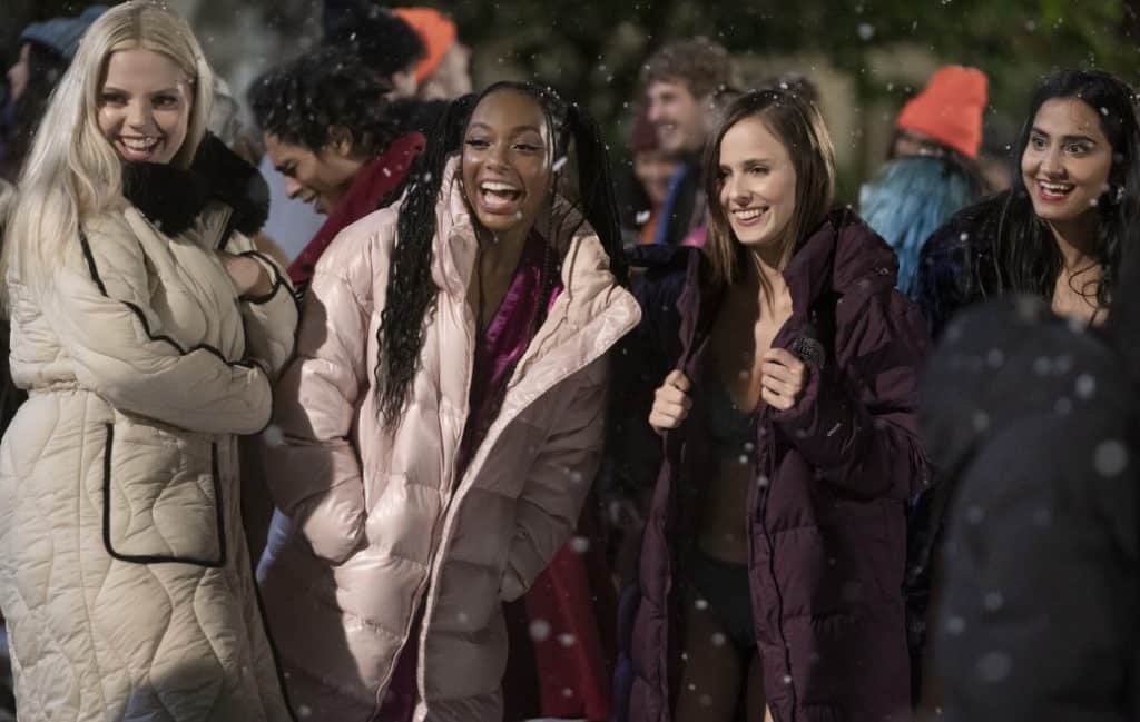 The four girls participate in the undie run in the snow.