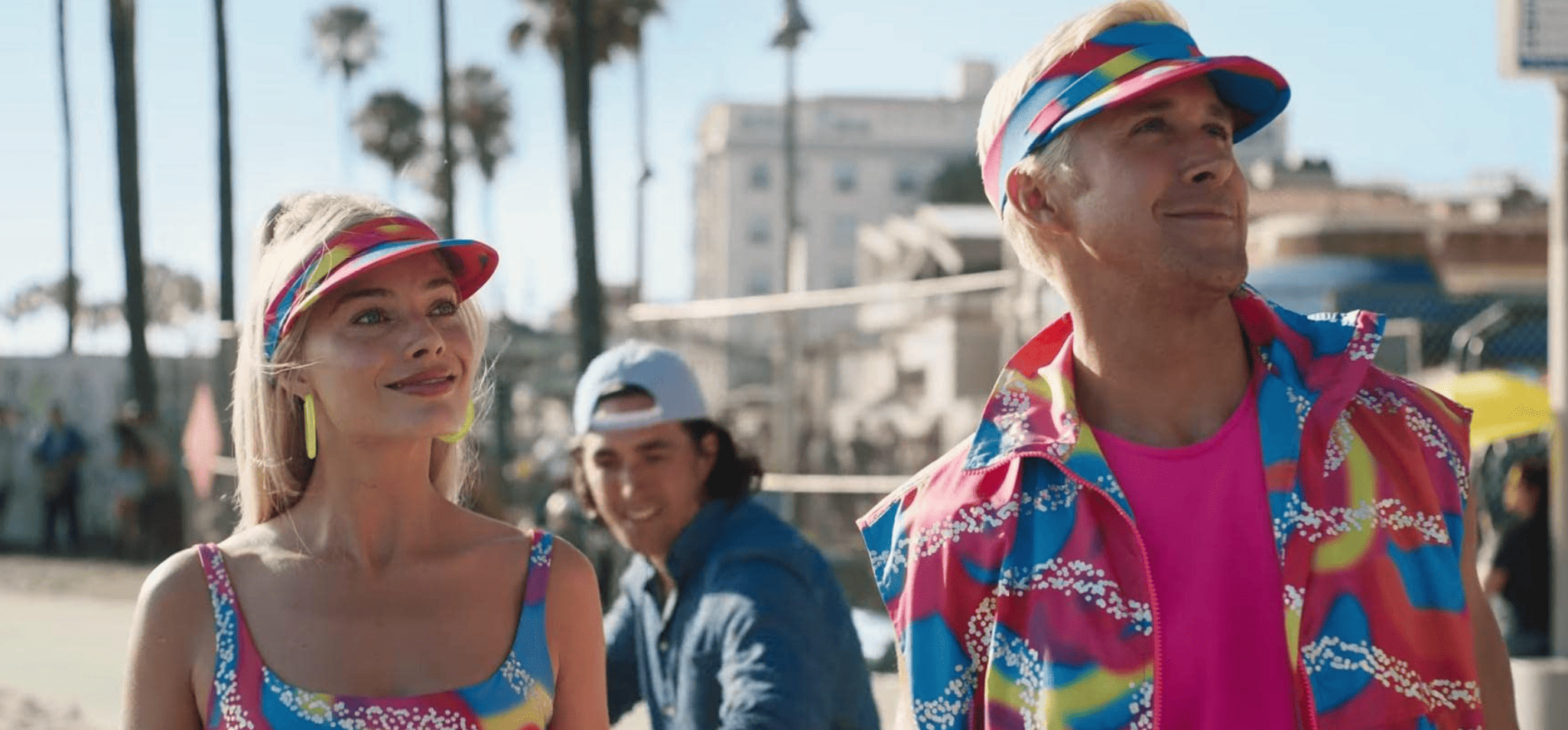Barbie (Margot Robbie) and Ken (Ryan Gosling) dressed in neon roller skating outfits in this image from HeyDay Films