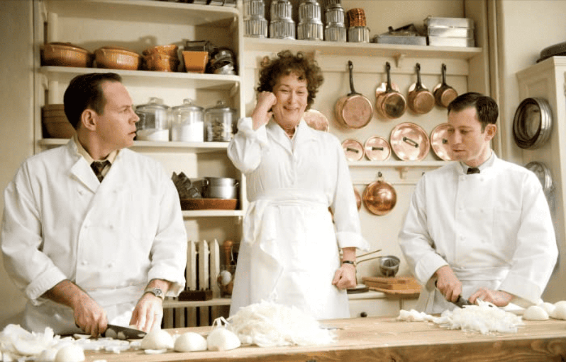 Three students at a cooking class in this image from Netflix